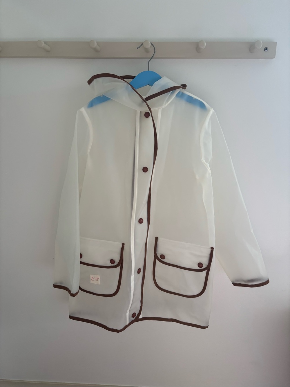 Fin & Vince Clear White Raincoat with Brown Trim